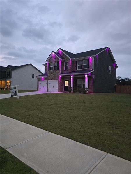 Front exterior of a new home in Fern Dale, Fairburn, GA, highlighting curb appeal (Image 37).