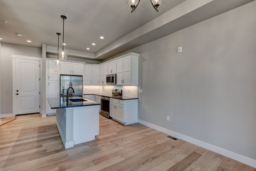 Representative furnished interior of a home built from the The Camden 2 by Landmark Homes in Highlands at Fox Hill, Longmont (Image 2).