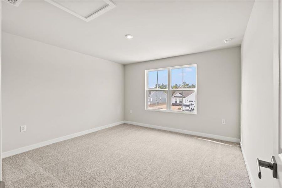 Spacious, unfurnished interior of a new home in Lakes at Riverbend Townhomes, Navassa (Image 20).