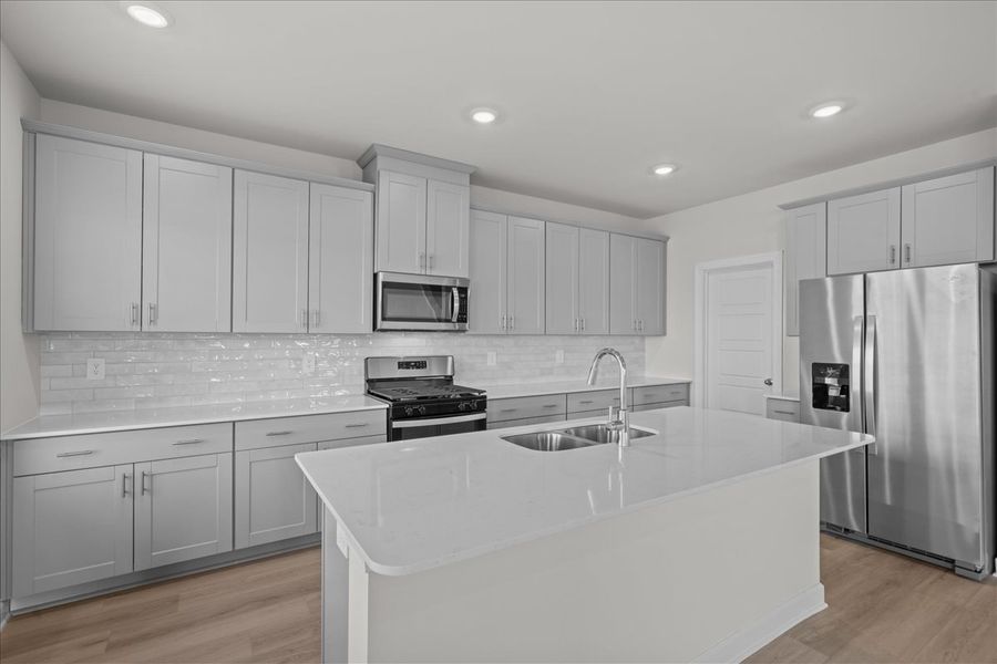 Furnished interior view inside a new home in The Farm at Wells Creek - Signature Collection, Gray Court (Image 4).