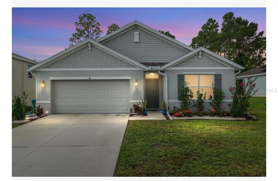 Front exterior of a new home in Lake Diamond, Ocala, FL, highlighting curb appeal (Image 1).