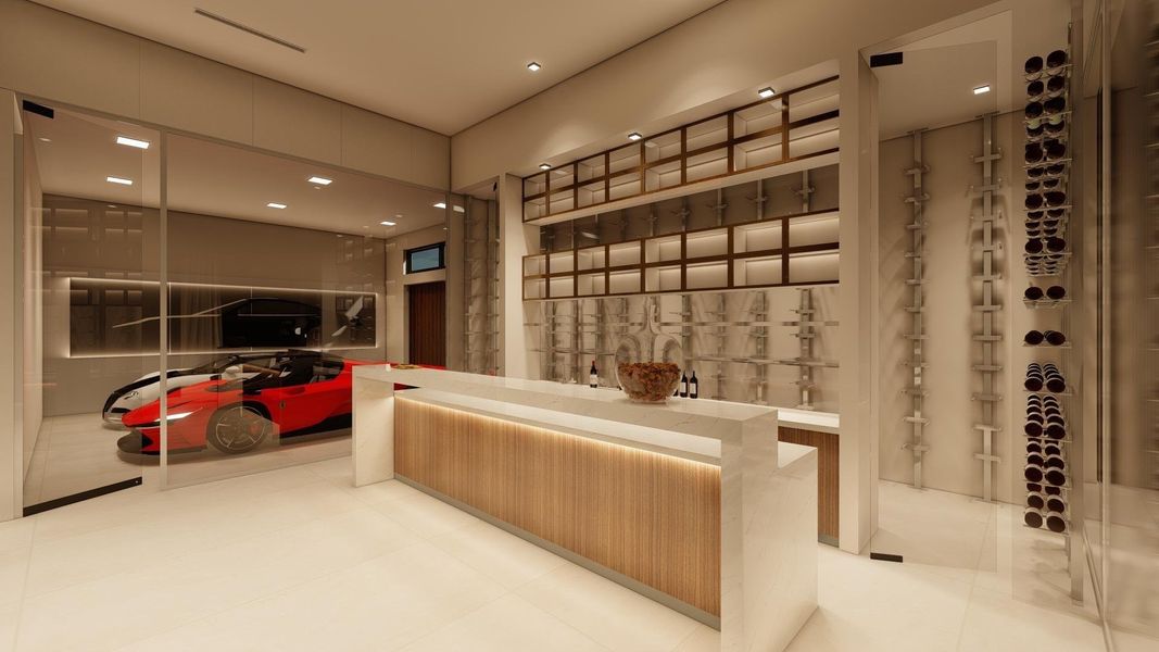 a one of a kind man cave featuring a full bar, wine room and a glass 2 car garage