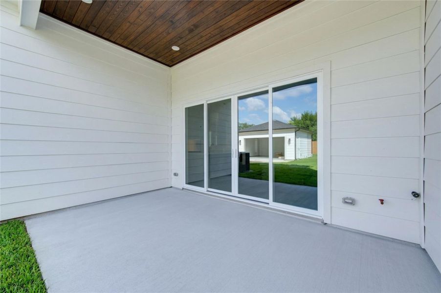 Exterior details and patio area of a home in , Houston (Image 4). Exterior details and patio area of a home in , Houston (Image 4).
