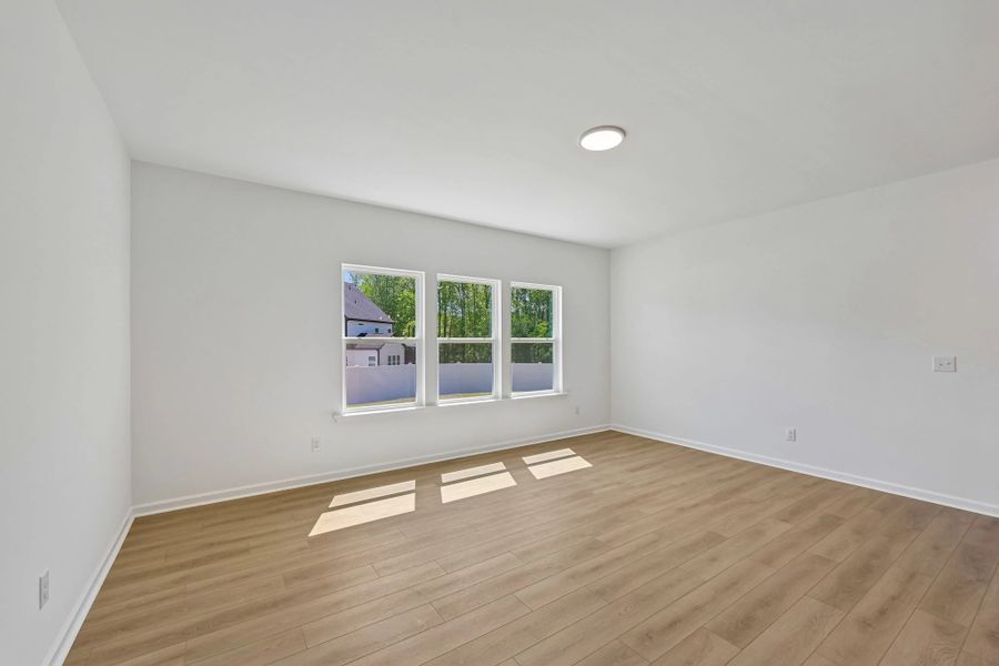 Spacious, unfurnished interior of a new home in Rowland's Grant, Fuquay Varina (Image 17).