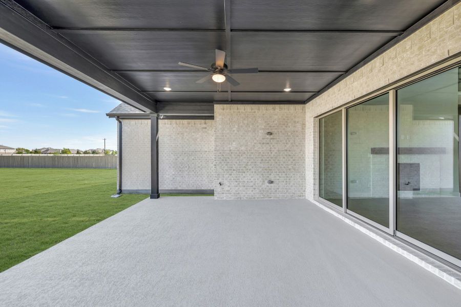 Exterior details and patio area of a home in Pecan Square - Estates, Northlake (Image 3). Exterior details and patio area of a home in Pecan Square - Estates, Northlake (Image 3).