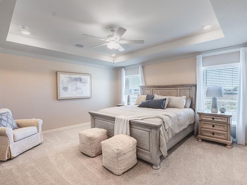 Sweet dreams await in your spacious owner`s suite, designed with an elegant tray ceiling - Raychel by Highland Homes