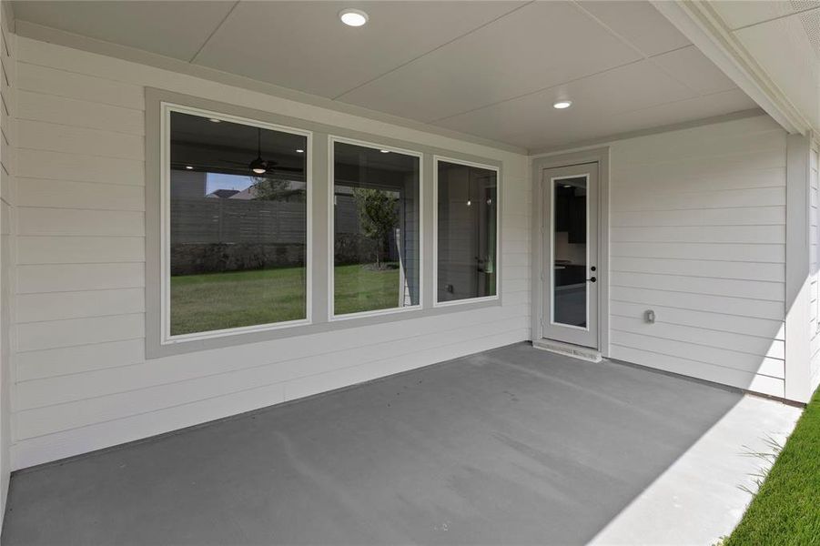 Exterior details and patio area of a home in Inspiration Collection 60 at Painted Tree, McKinney (Image 2). Exterior details and patio area of a home in Inspiration Collection 60 at Painted Tree, McKinney (Image 2).