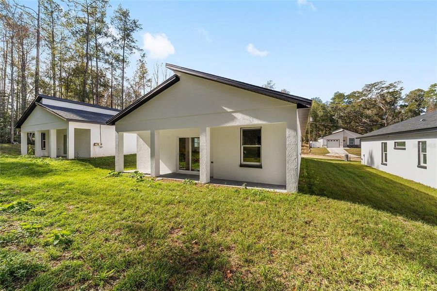 Exterior details and patio area of a home in , Ocala (Image 23).