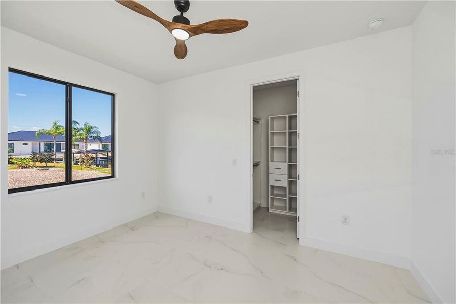 Spacious, unfurnished interior of a new home in , Port Charlotte (Image 25).