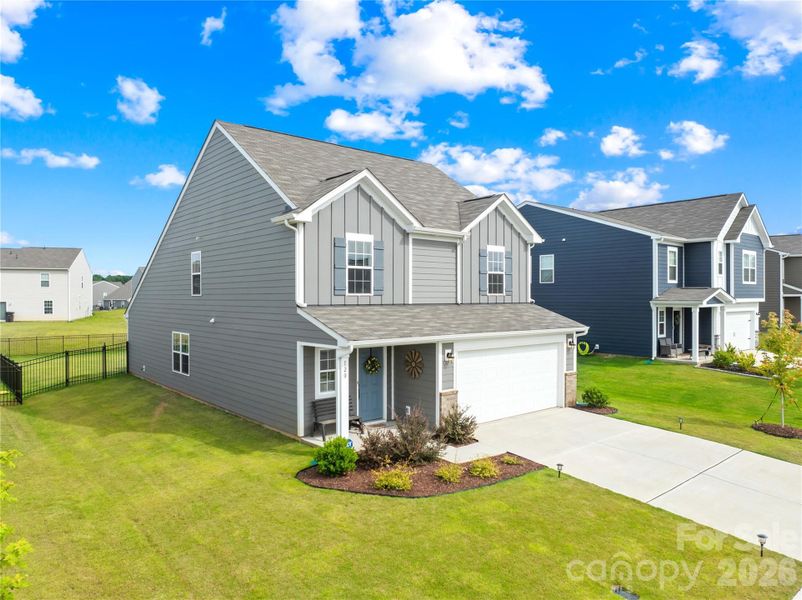 Front exterior of a new home in Sullivan Farm, Statesville, NC, highlighting curb appeal (Image 21).