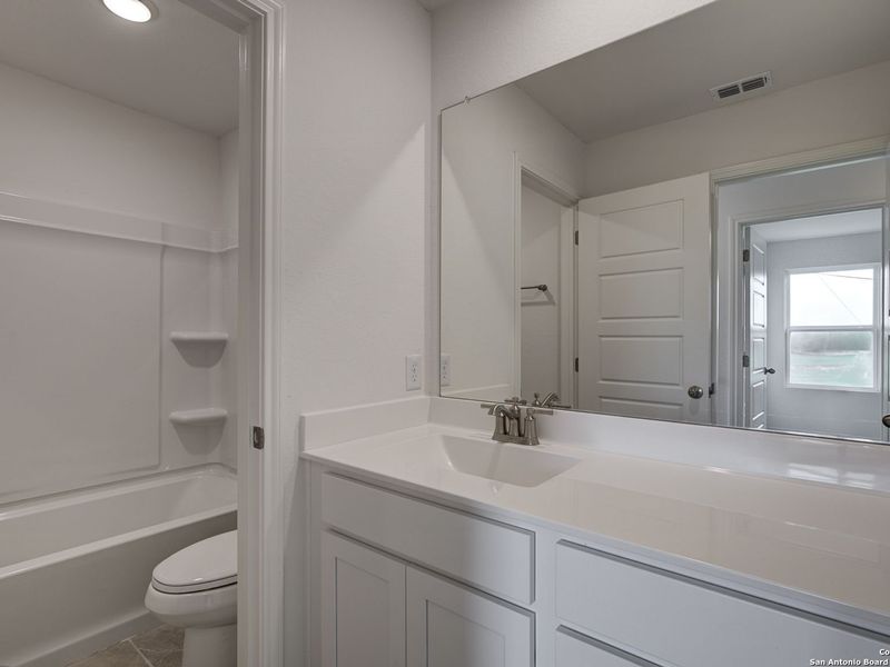 Furnished interior view inside a new home in Applewhite Meadows, San Antonio (Image 29).