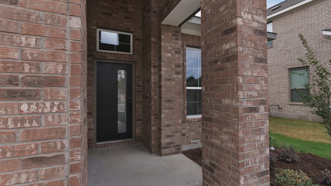Exterior details and patio area of a home in Lariat, Liberty Hill (Image 2). Exterior details and patio area of a home in Lariat, Liberty Hill (Image 2).