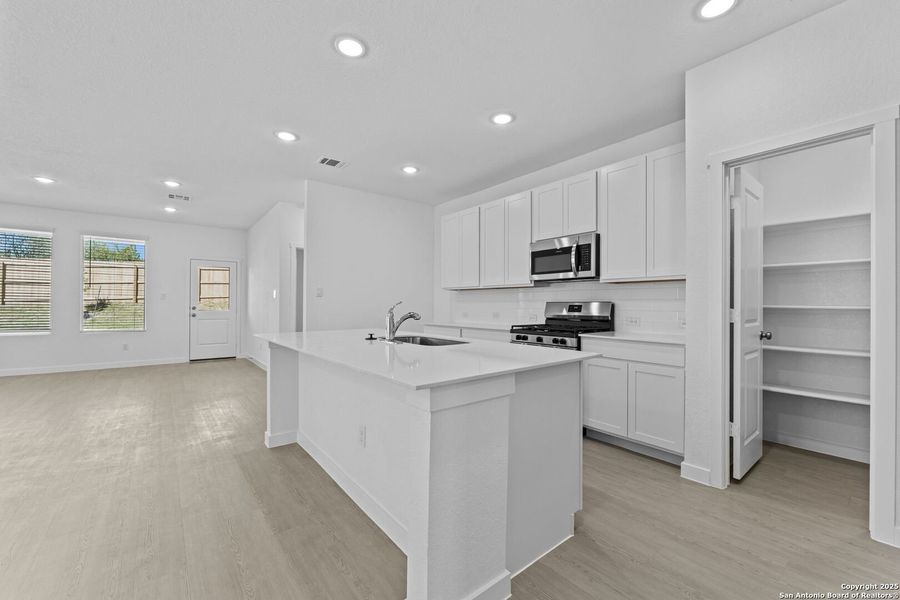 Furnished interior view inside a new home in , New Braunfels (Image 6).