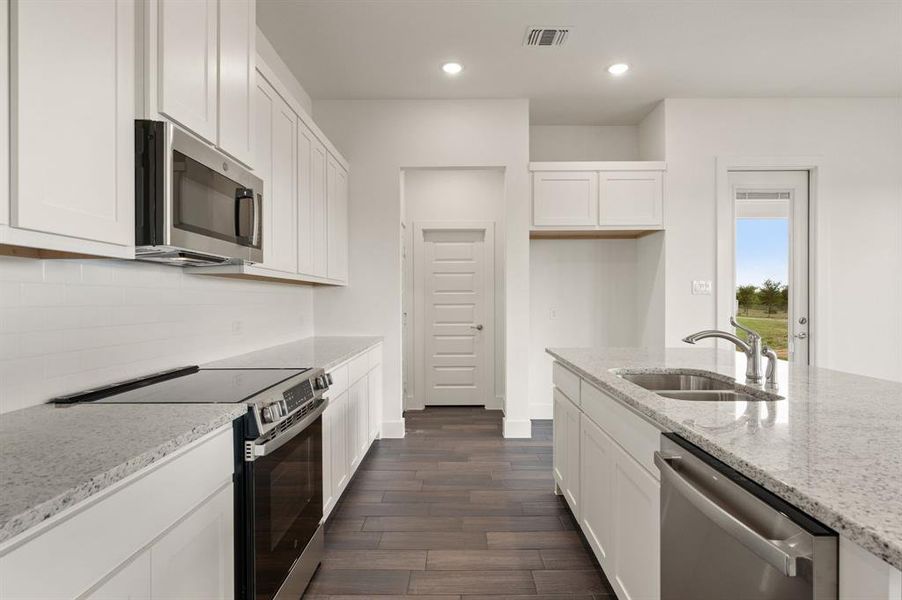 Furnished interior view inside a new home in Saddleback Estates, Boyd (Image 13).