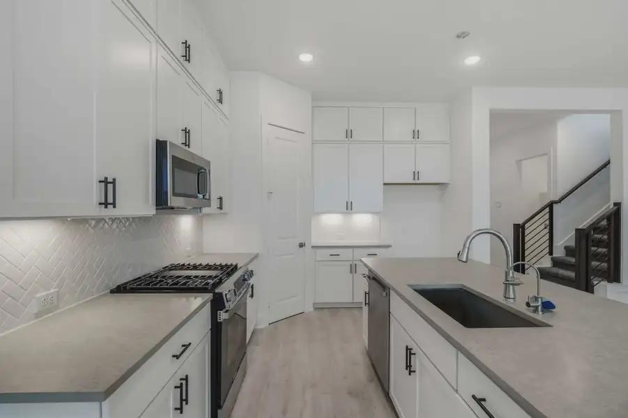 Representative furnished interior of a home built from the Talos by Chesmar Homes in Prominence Urban, San Antonio (Image 3).