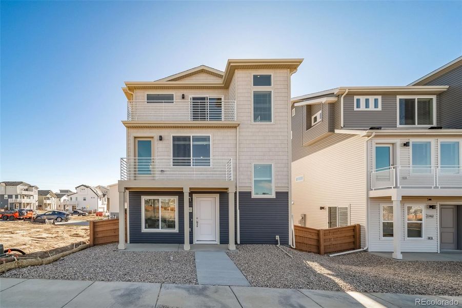 Front exterior of a new home in , Commerce City, CO, highlighting curb appeal (Image 21).