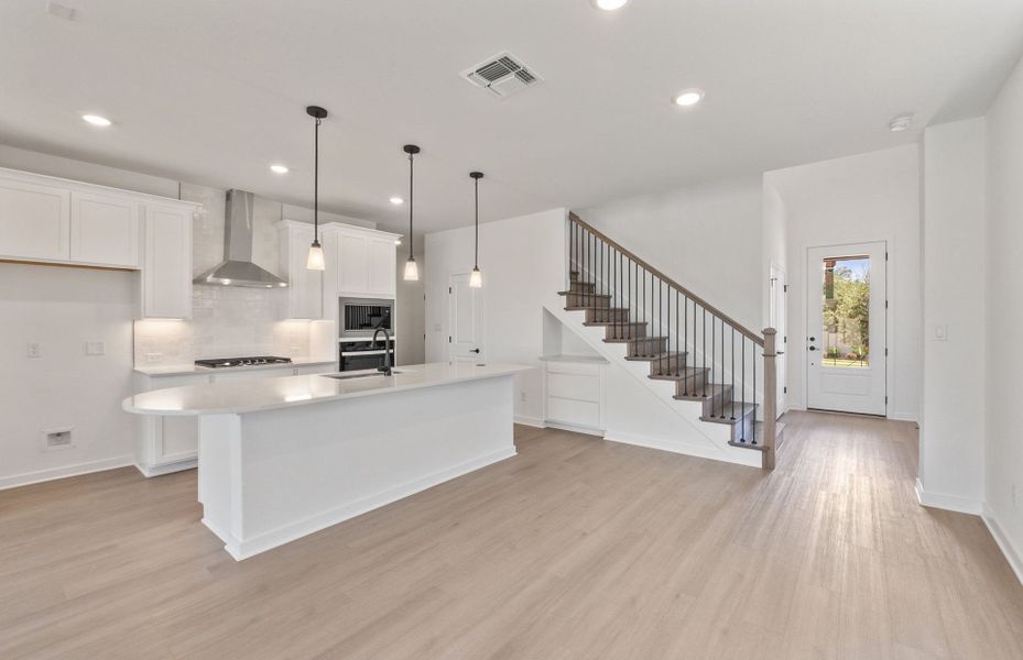 Furnished interior view inside a new home in Wolf Ranch, Georgetown (Image 9).