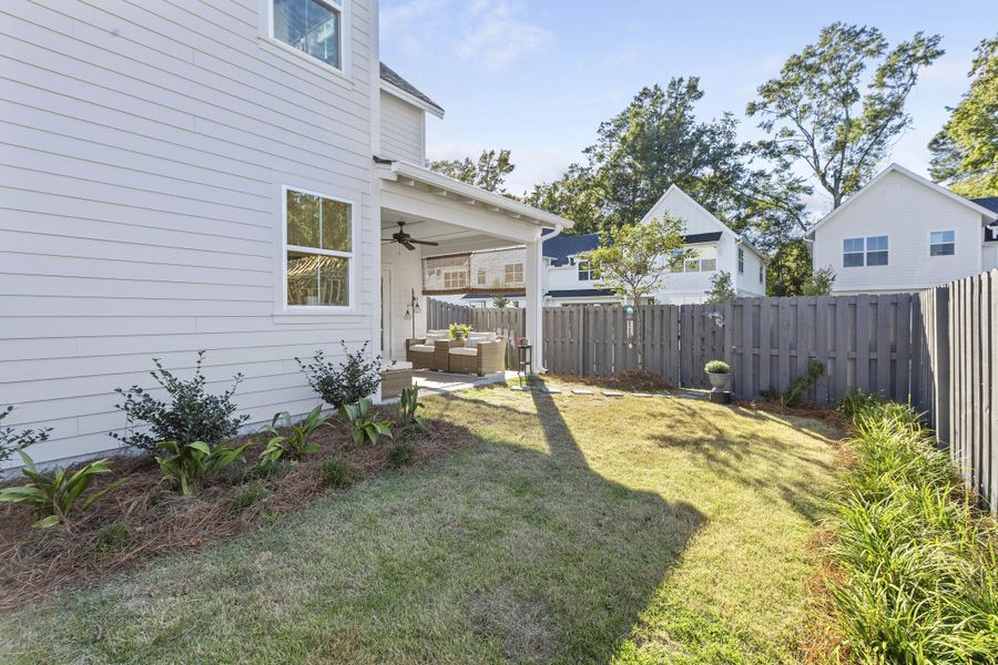 Exterior details and patio area of a home in , Johns Island (Image 27).