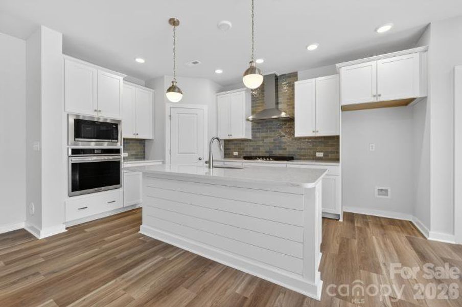 Furnished interior view inside a new home in North Creek Village - Townhomes, Huntersville (Image 8).