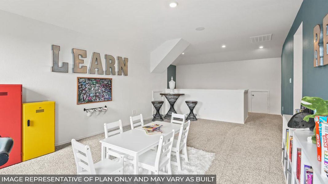 Furnished interior view inside a new home in Sunterra, Katy (Image 24).