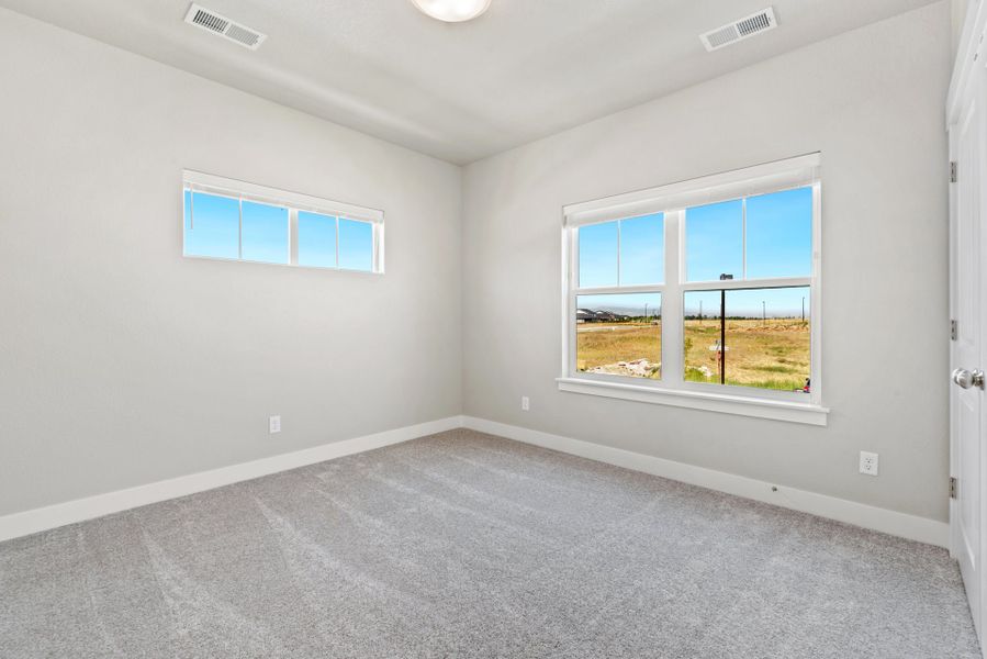 Representative unfurnished interior of a home built from the The Cambridge 2 by Landmark Homes in The Lakes at Centerra, Loveland (Image 15).
