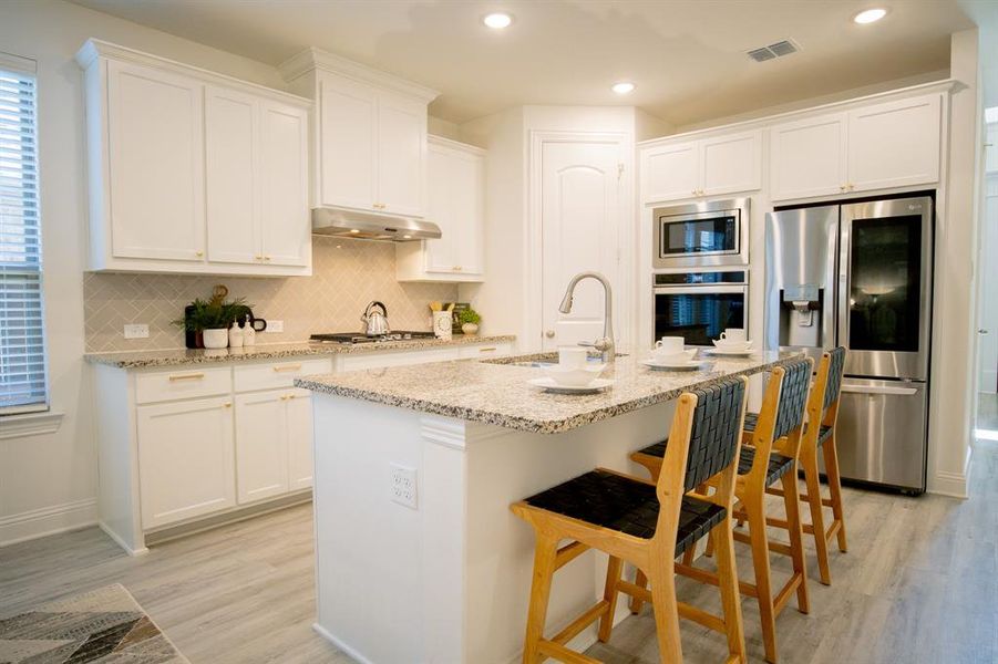 Furnished interior view inside a new home in Mustang Lakes 74', Celina (Image 11).