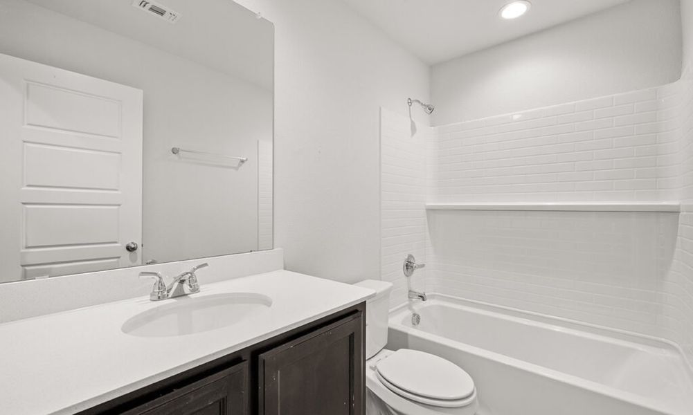 Representative exterior photo of a completed home built from the Walden II by Impression Homes in Stone Eagle, Azle, TX (Image 21).