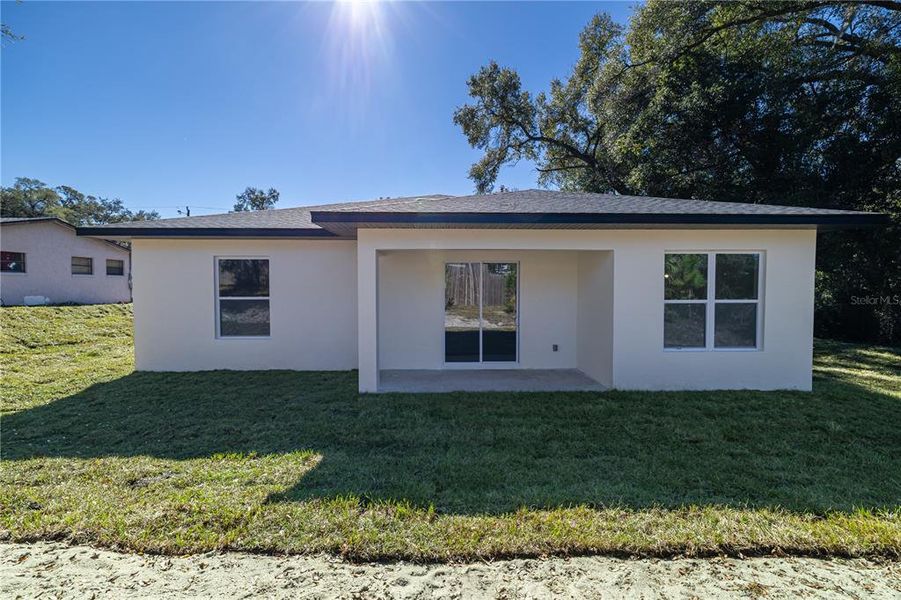 Exterior details and patio area of a home in , Deland (Image 30).