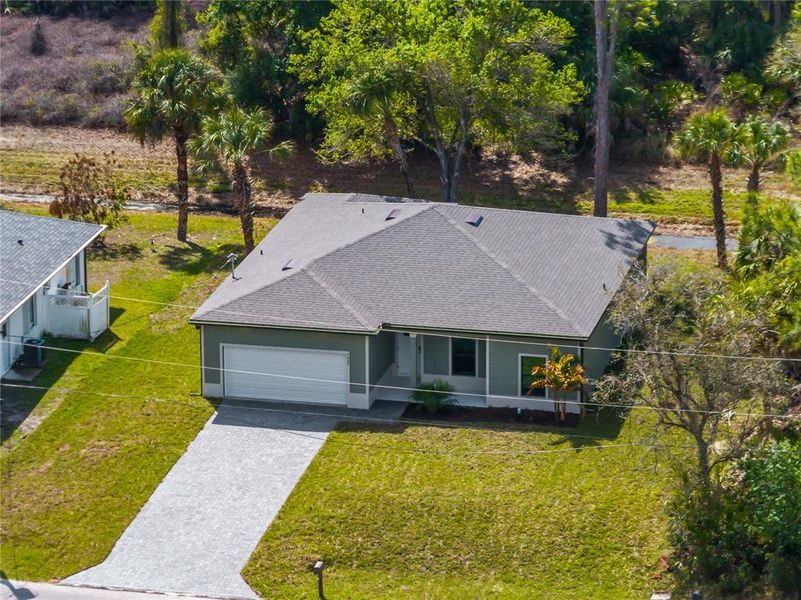 Front exterior of a new home in , North Port, FL, highlighting curb appeal (Image 23).