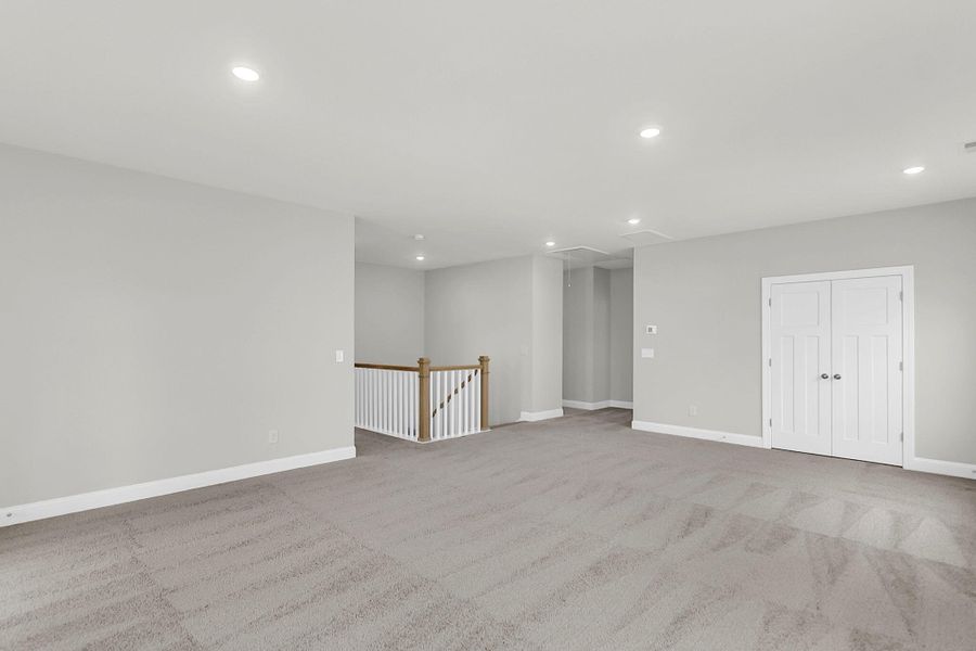 Spacious, unfurnished interior of a new home in Tidewater at Lakes of Cane Bay, Summerville (Image 29).