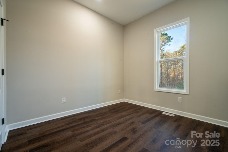 Primary bathroom with a Separate, enclosed toilet room for added privacy.