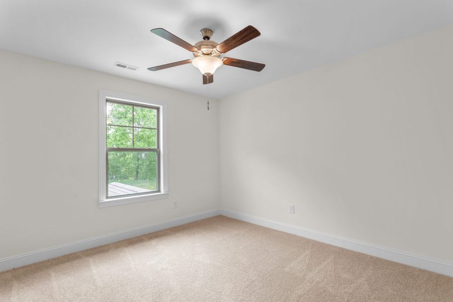Representative unfurnished interior of a home built from the Fairfield Lux by Keystone Homes NC in Weybridge, Burlington (Image 22).