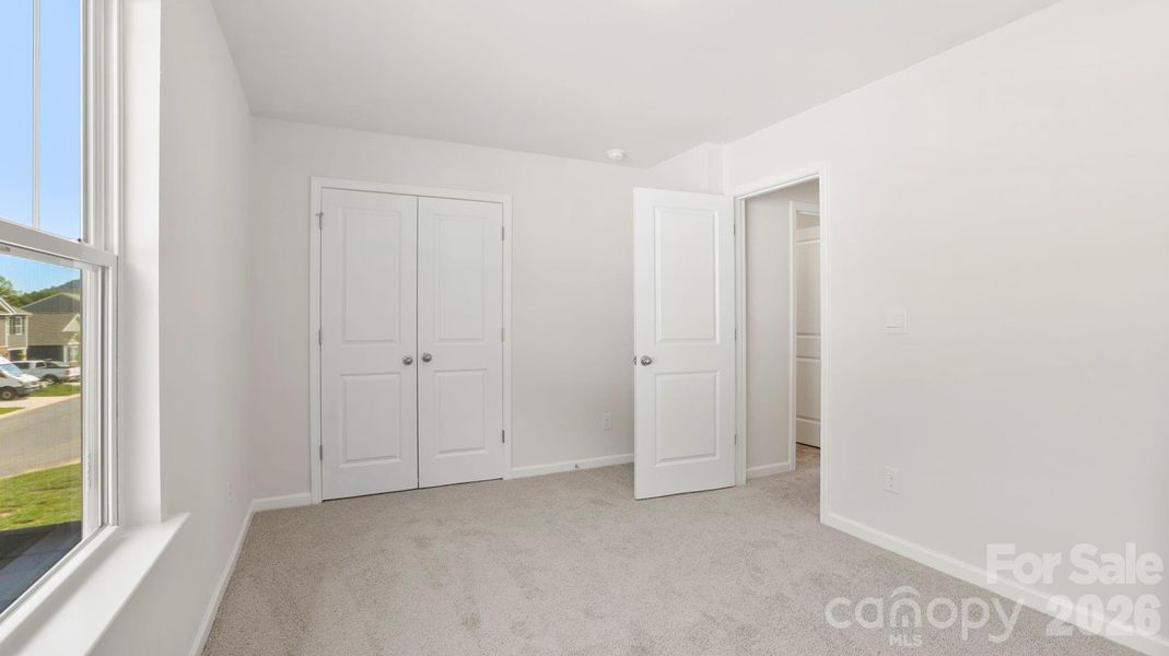 Spacious, unfurnished interior of a new home in Wildbrook Village, Waynesville (Image 27).