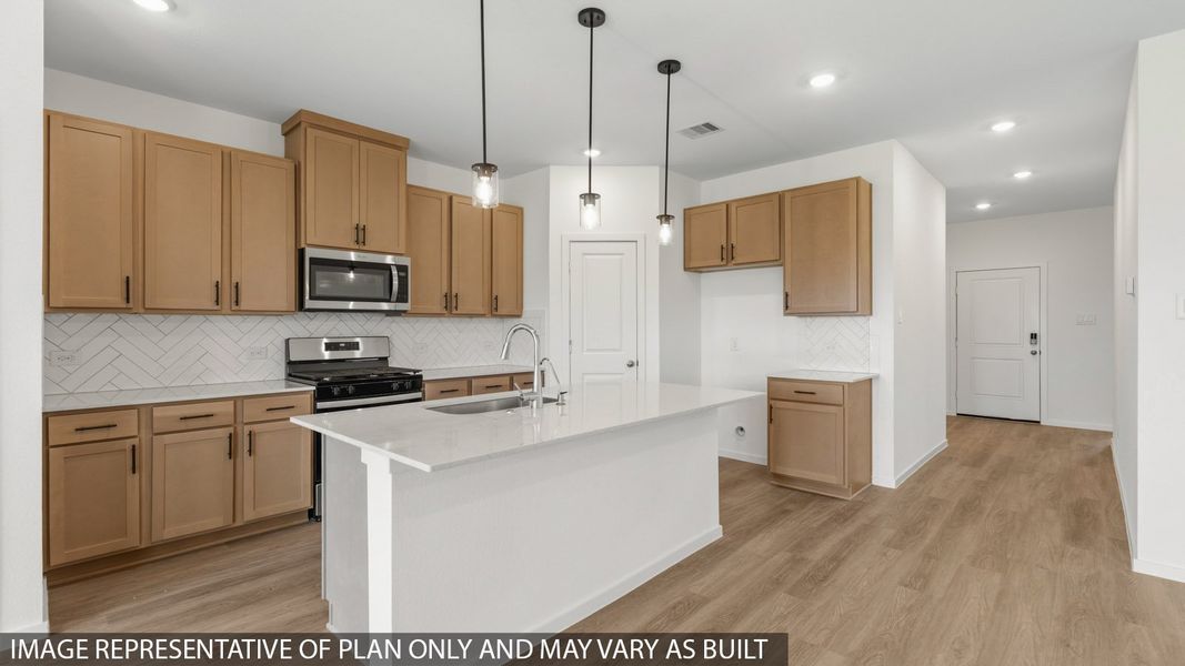 Furnished interior view inside a new home in Sunterra, Katy (Image 6).