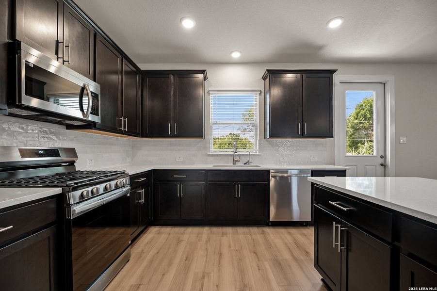 Furnished interior view inside a new home in Trilogy Grove, San Antonio (Image 6).