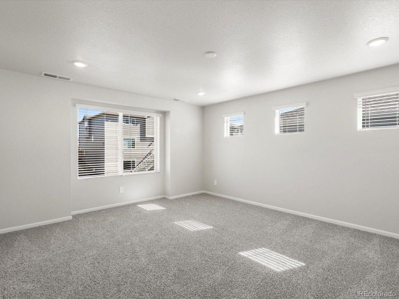 Spacious, unfurnished interior of a new home in Buffalo Highlands: The Flora Collection, Commerce City (Image 21). Spacious, unfurnished interior of a new home in Buffalo Highlands: The Flora Collection, Commerce City (Image 21).