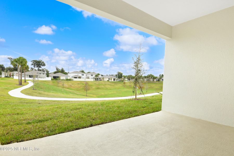 Exterior details and patio area of a home in Seasons at Grandview Gardens, Deland (Image 4).