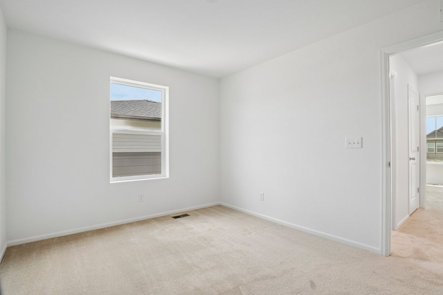Spacious, unfurnished interior of a new home in The Cottages Collection at Ridgeline Vista, Brighton (Image 20).