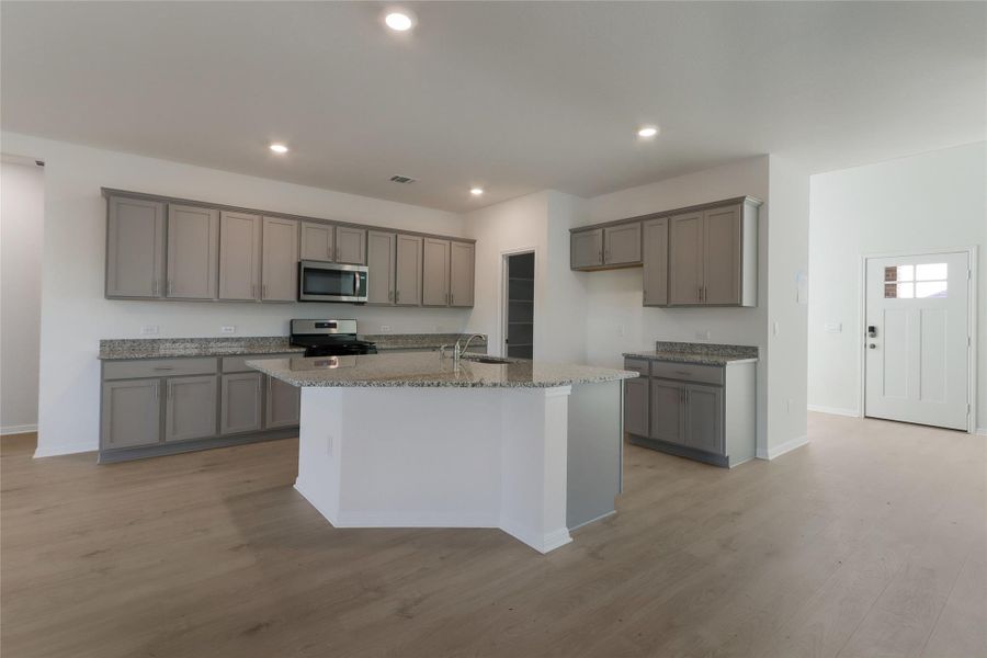 Furnished interior view inside a new home in Bar W Ranch, Leander (Image 5). Furnished interior view inside a new home in Bar W Ranch, Leander (Image 5).