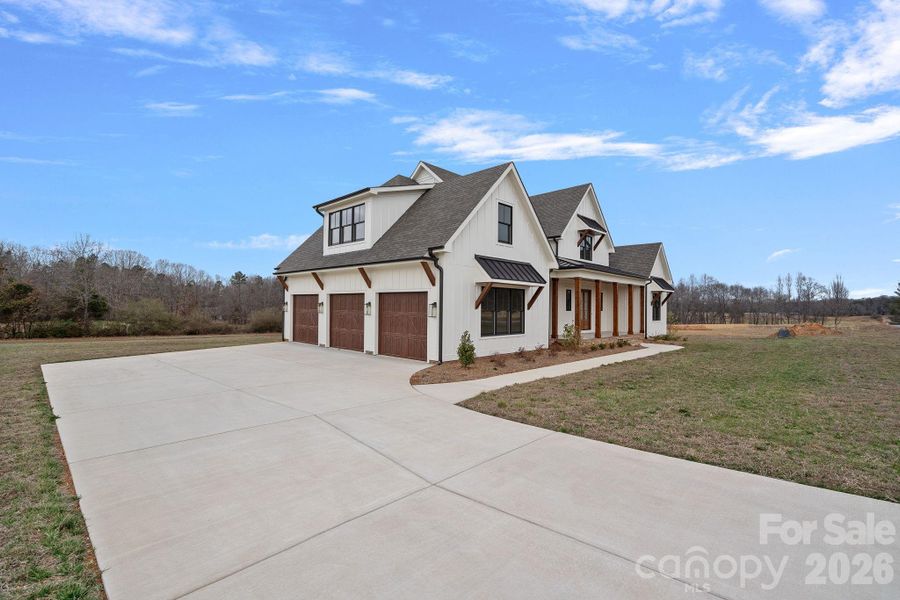Front exterior of a new home in , Statesville, NC, highlighting curb appeal (Image 2). Front exterior of a new home in , Statesville, NC, highlighting curb appeal (Image 2).