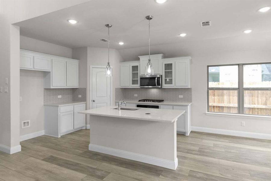 Furnished interior view inside a new home in Leonard Trails, Anna (Image 4).