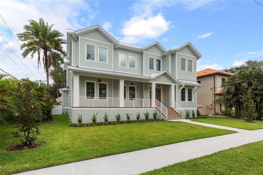 Front exterior of a new home in , Tampa, FL, highlighting curb appeal (Image 26). Front exterior of a new home in , Tampa, FL, highlighting curb appeal (Image 26).
