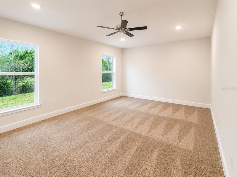 Spacious, unfurnished interior of a new home in Harmony Central, St. Cloud (Image 16).