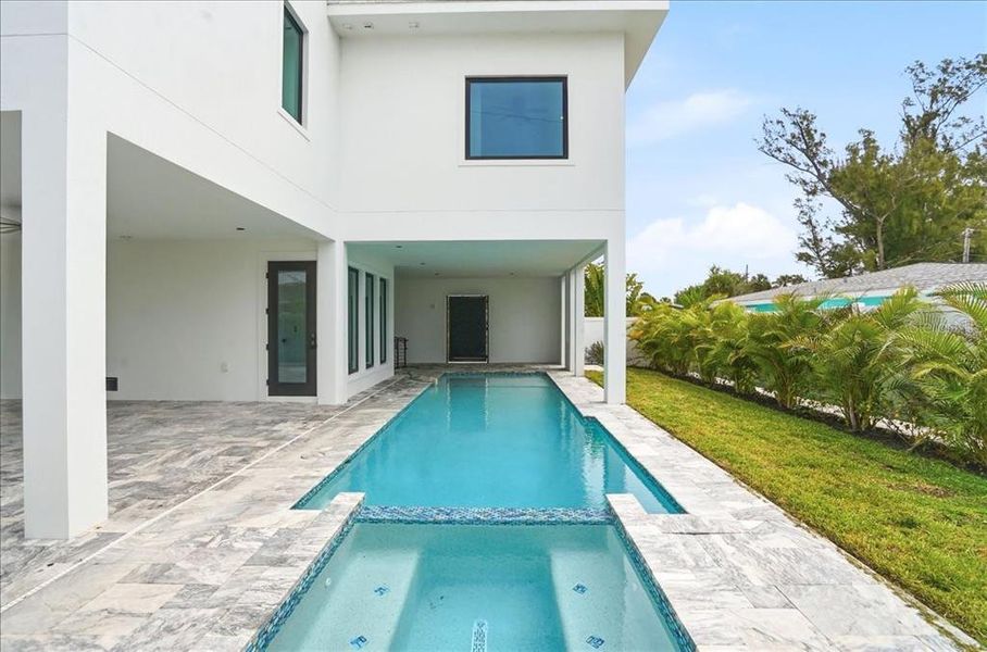 Exterior details and patio area of a home in , Englewood (Image 52).