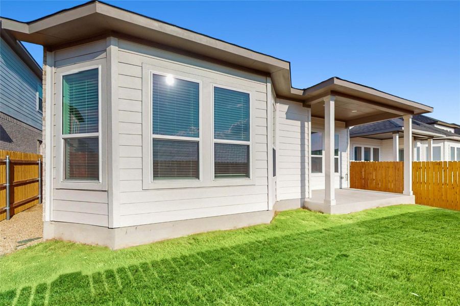 Exterior details and patio area of a home in Estancia West, Manchaca (Image 3). Exterior details and patio area of a home in Estancia West, Manchaca (Image 3).