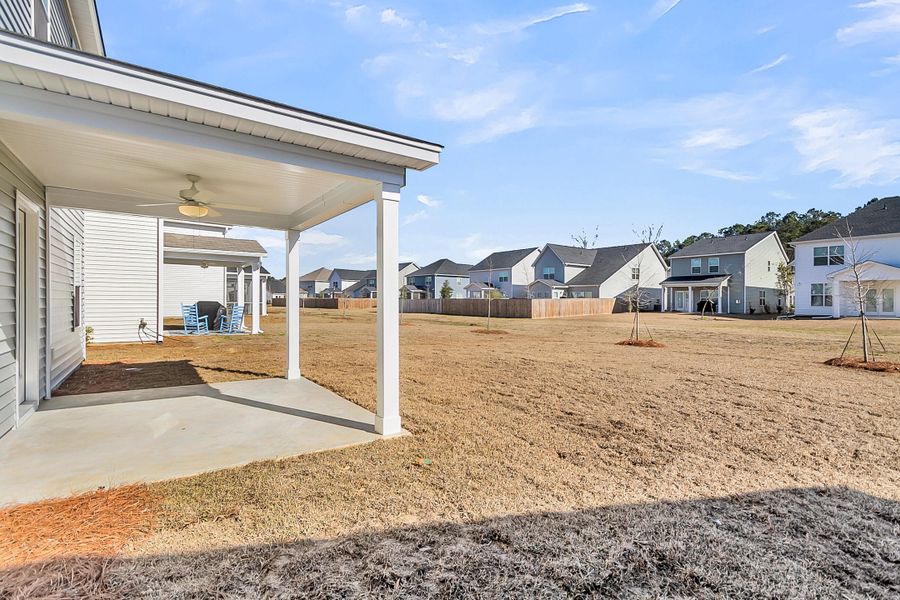 Exterior details and patio area of a home in Six Oaks, Summerville (Image 4).