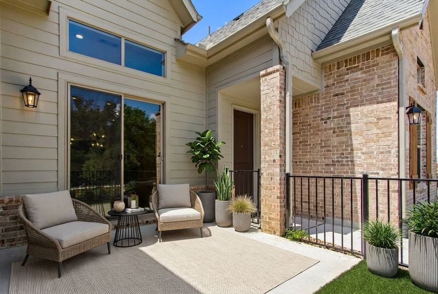 Exterior details and patio area of a home in Cottonwood Creek, Rowlett (Image 27).