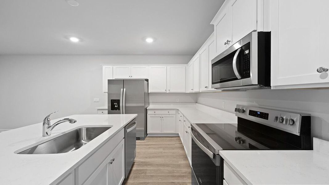 Furnished interior view inside a new home in Garbon Fields, Summerville (Image 9).
