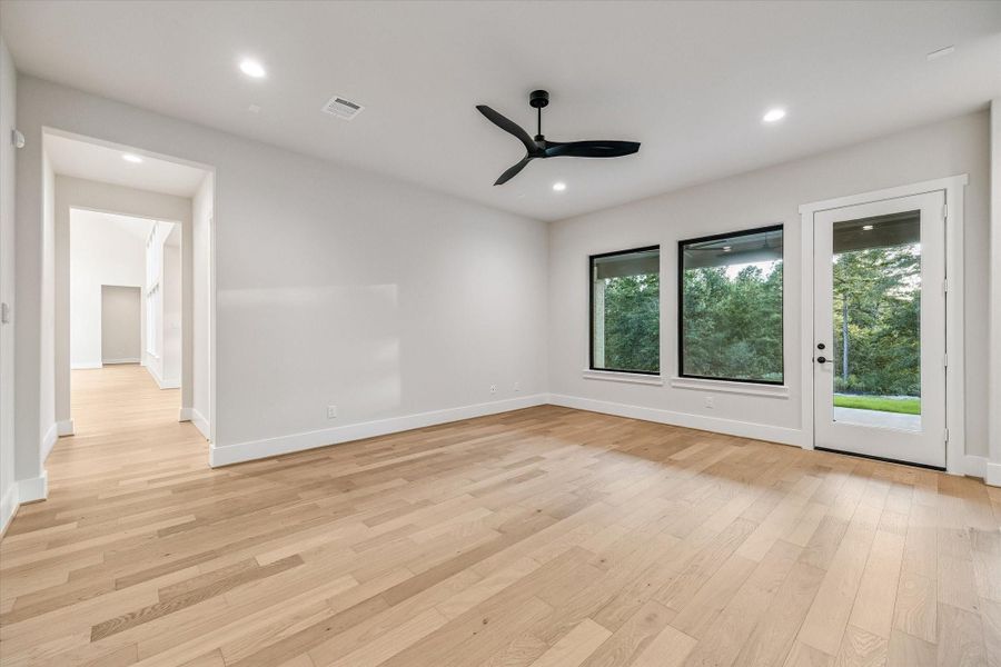 Game Room/Flex Space with direct access to Back Porch and yard. Game Room/Flex Space with direct access to Back Porch and yard.