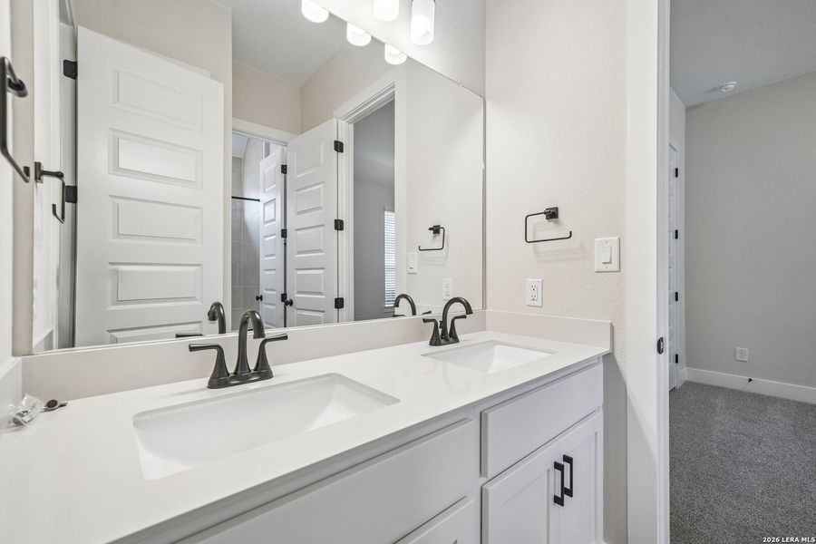 Furnished interior view inside a new home in Village at Three Oaks, Seguin (Image 7).